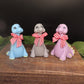 Blue, Gray and Pink examples of adorable brontosaurus goat milk soap